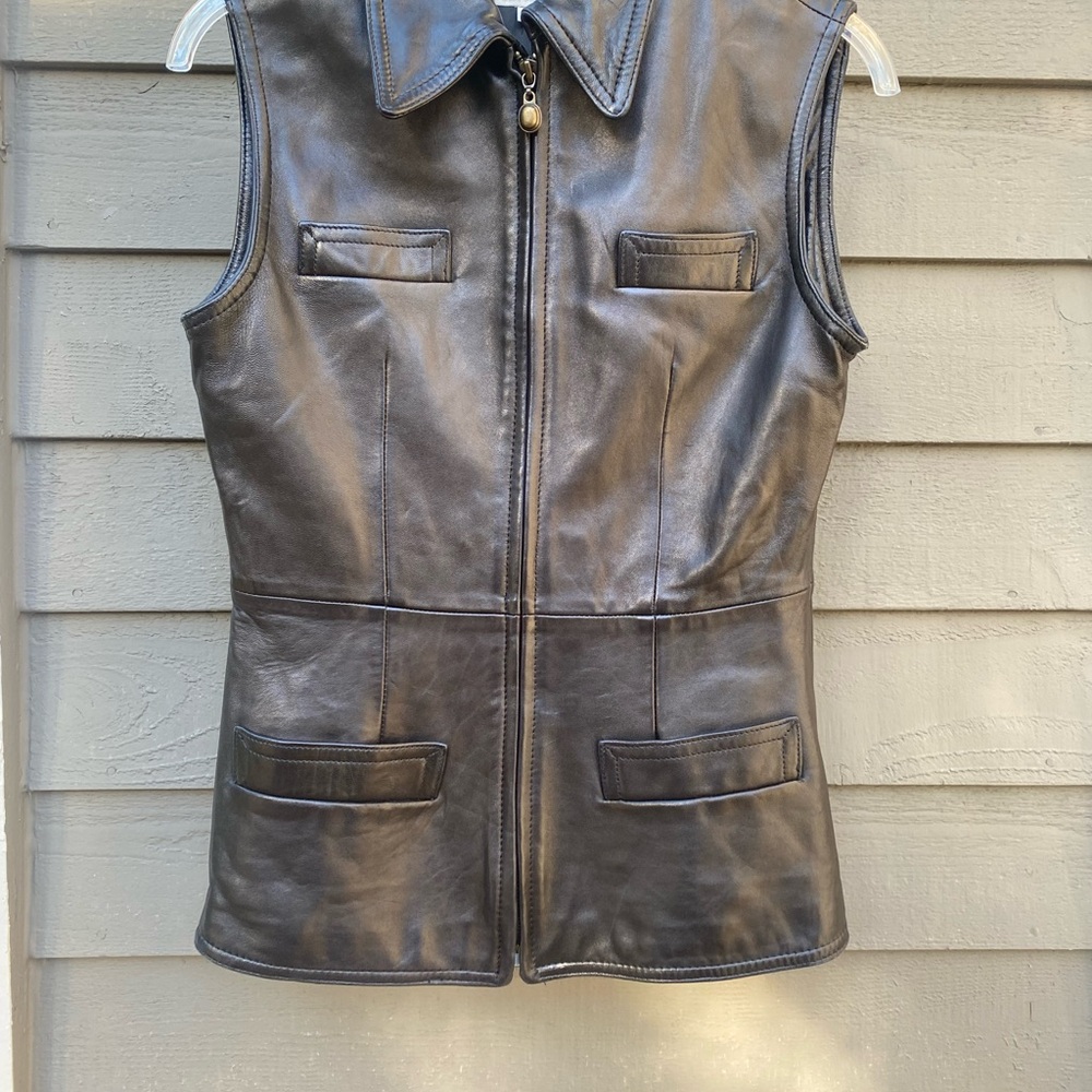Bebe black leather vest size 6 vintage. This is a beauty!!
